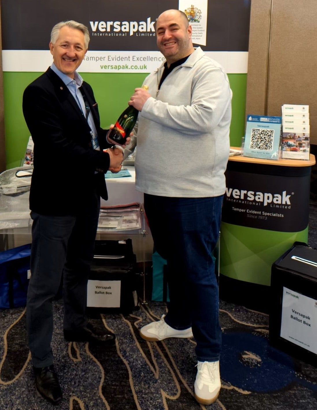 Jamie from Wavering winning Champagne at AEA 2025